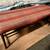NEW Bench red striped cushioned top with gunmetal base 1 thumbnail