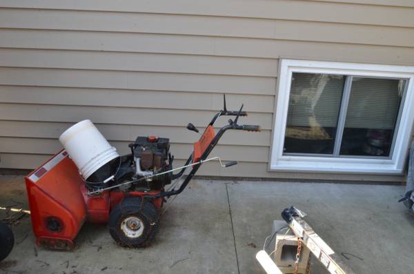 Snow Blower has chains and electric start 1