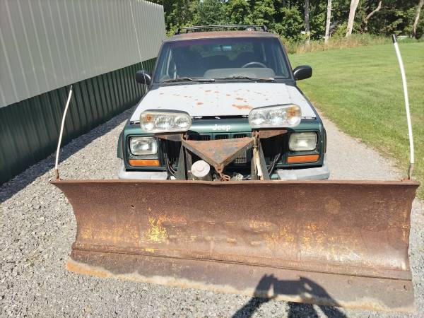 2000 JEEP CHEROKEE 4.0L FISHER 6.5FT PLOW - $1,200 (UTICA)63442707971713121