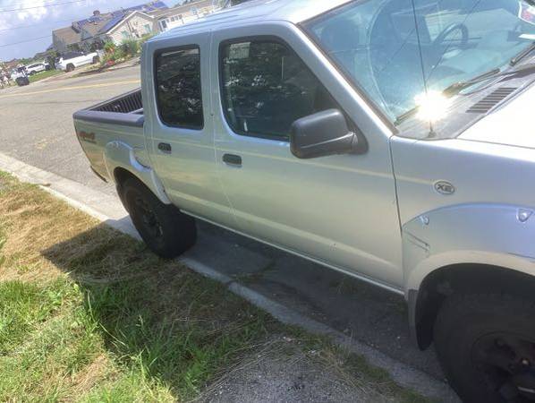2004 Nissan Frontier  Se v6 pickup crew cab - $3,95063654716291715123