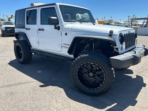 2015 Jeep Wrangler Unlimited Sport - $18,49963470597016833122
