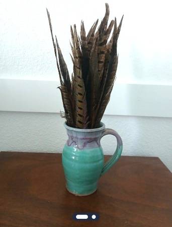 Handcrafted Ceramic Pitcher with Feathers 1