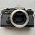 Olympus OM-2N Black 35mm film camera with 35-70mm zoom lens 2 thumbnail