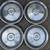 Four 15 inch 1970 Cadillac Classic steel hubcaps  1 thumbnail