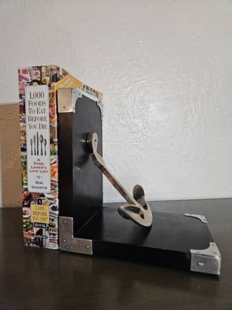 Nautical Bookend With A Black Base And A Silver Anchor 1