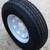 16" Mastertrack Trailer Tire 235 80 R16 E on 8 Lug White Spoke Wheel 2 thumbnail