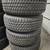 BRAND NEW GMC SIERRA WHEELS WITH NEW BRIDGESTONE DUELER AT TIRES 2 thumbnail