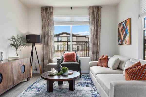 Granite Countertops, Dual Vanities, Elegant Hardwood-Style Flooring 1