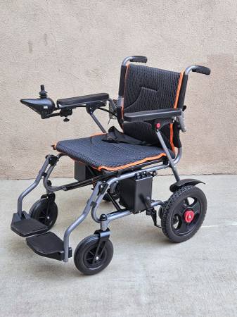 Folding Lightweight Electric Wheelchair New Condition 1
