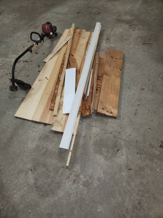 Miscellaneous wood pieces and an old weed whip 1