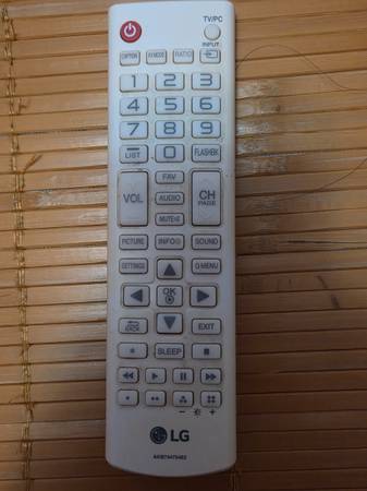 24 inch LG TV with remote - $5063471342501379121