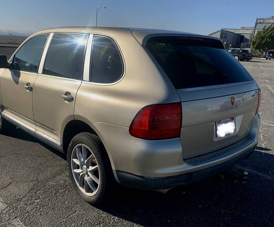 **ROBUST & LUXURIOUS SUV**  2004 GOLD PORSCHE CAYENNE S AWD V8 - $3,000 (alameda)63624254359169122