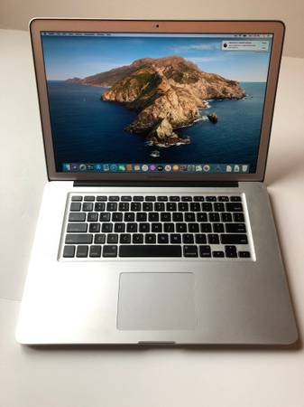 Macbook Pro 15in screen 8GB RAM and 512GB disk 1