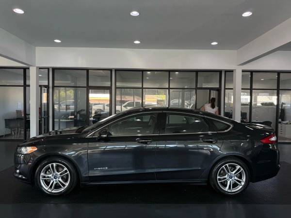 2015 Ford Fusion Titanium Híbrido Sedán 4D 4 Cilindros, Híbrido, 2.0 Litros - C - $7995.0063435710041475123