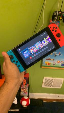 FREE Nintendo Switch Bundle includes 3 Controllers, 3 Games, 2 Traveling Cases,  1