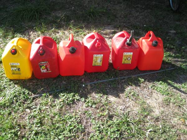 Five of 5 Gallon gas and diesel cans 1