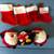 5 santa hats, 4 small stockings 2 stuffed fat santas and a penguin 4 thumbnail