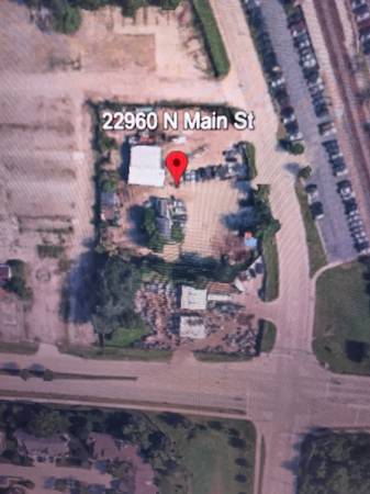 Land plus two buildings ideal for landscaping business. 1