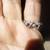 14K w gold sapphire + diamond XO Ring 1 thumbnail