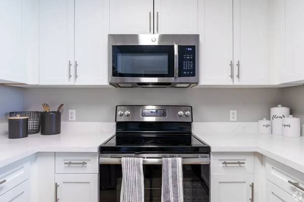 Package Receiving, On-Site Laundry Facilities, Custom Wood Cabinetry 1