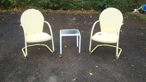 pair of metal patio chairs and table used all for 1