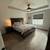 This ranch modern farmhouse features Hardie plank siding with board an 9 thumbnail