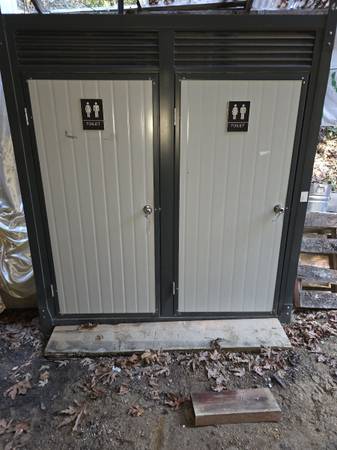 Portable bathrooms with flushing toilets and sinks 1