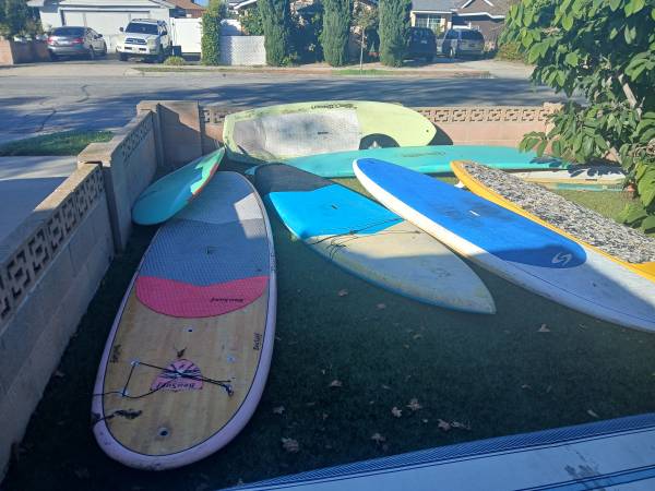 8 USED PADDLE BOARDS 1