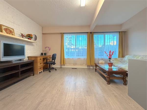 Utilities include spacious ground level 2-bedroom suite. 1