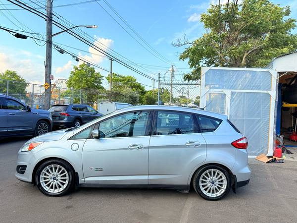 2016 Ford C-Max Híbrido Energía Enchufable SEL - $6.800 (Brooklyn)63470617069953123