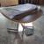 Table with New leaf extension measuring 17 1/4 inch.  Wood with Metal legs. 1 thumbnail