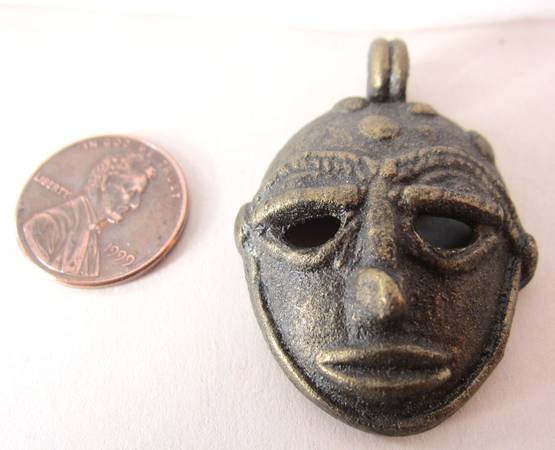 Bronze face pendant 1
