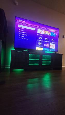 70 Inch TV w/ TV Table and Chest 1