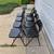Eight black metal folding chairs 2 thumbnail