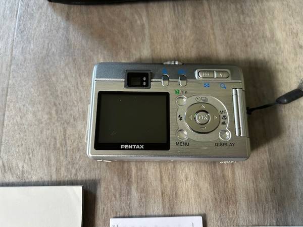 PENTAX OPTIO S50 5MP DIGITAL CAMERA WITH MANUALS AND CASE