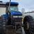 FOR SALE: New Holland TV140 Tractor + Blower 1 thumbnail