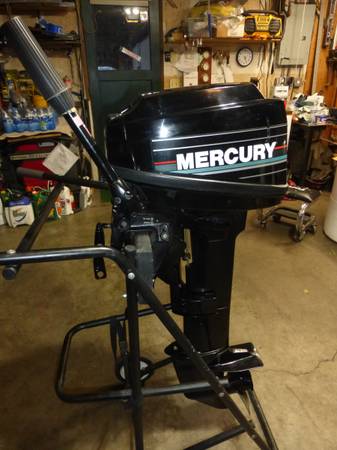 15 horse Mercury 2 stroke outboard 1
