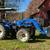 Tractor and small backhoe work 1 thumbnail
