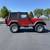 Adventure-Ready 1997 Jeep Wrangler Sport in Vibrant Red 5 thumbnail