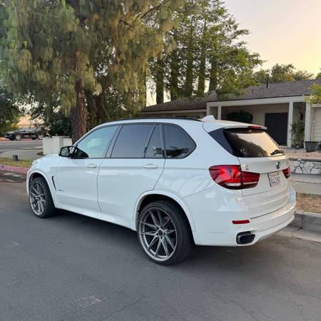 BMW X5 - $9,900 (Granada Hills)63618239155843124