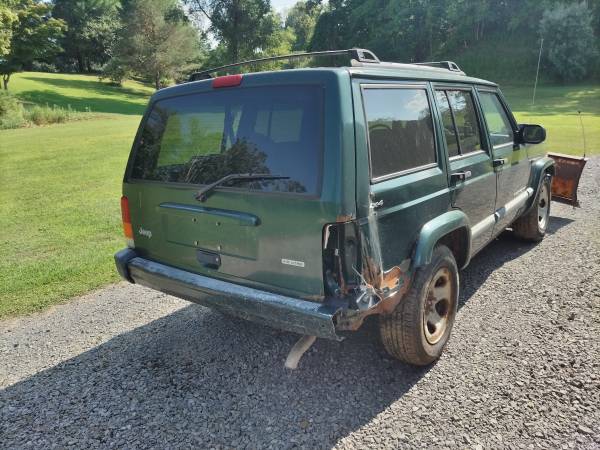 2000 JEEP CHEROKEE 4.0L FISHER 6.5FT PLOW - $1,200 (UTICA)63442707971713122
