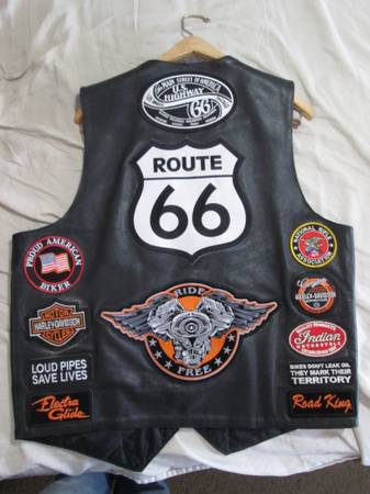 LEATHER MOTORCYCLE VEST WITH PINS AND PATCHES 1