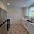 Remodeled unit w/parking, new appliances, floors, ceiling fans, & more 1 thumbnail
