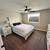 This ranch modern farmhouse features Hardie plank siding with board an 14 thumbnail