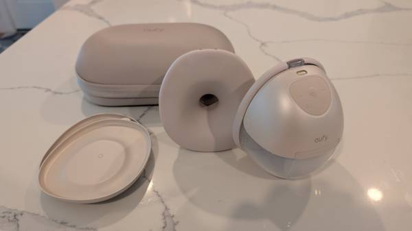 Eufy Wearable Breast Pump S1 Pro with Charging Case + Extra Containers 1