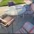 Patio table/3 chairs and two reclining lounge chairs with pads 1 thumbnail