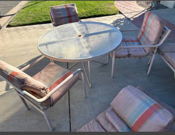 Patio table/3 chairs and two reclining lounge chairs with pads 1