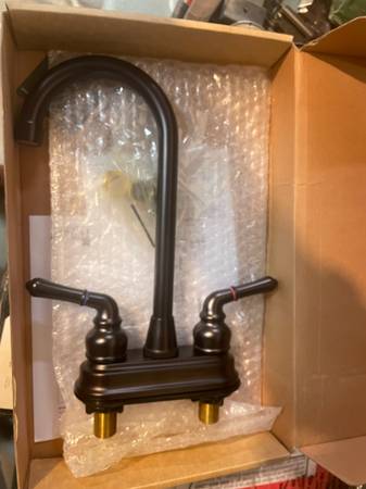 kingston brass magellan oli rubbed bronze faucet 1