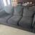 Black sofa couch 7 feet wide 34" deep. Comfortable in good condition 1 thumbnail