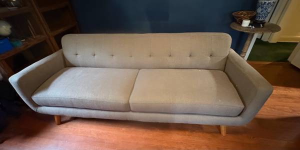 Light Brown Comfortable Couch.  Barely used.  33” deep by 85” long. 1